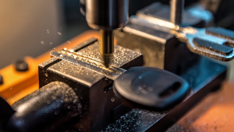 Locksmith installing secure lock for residential property